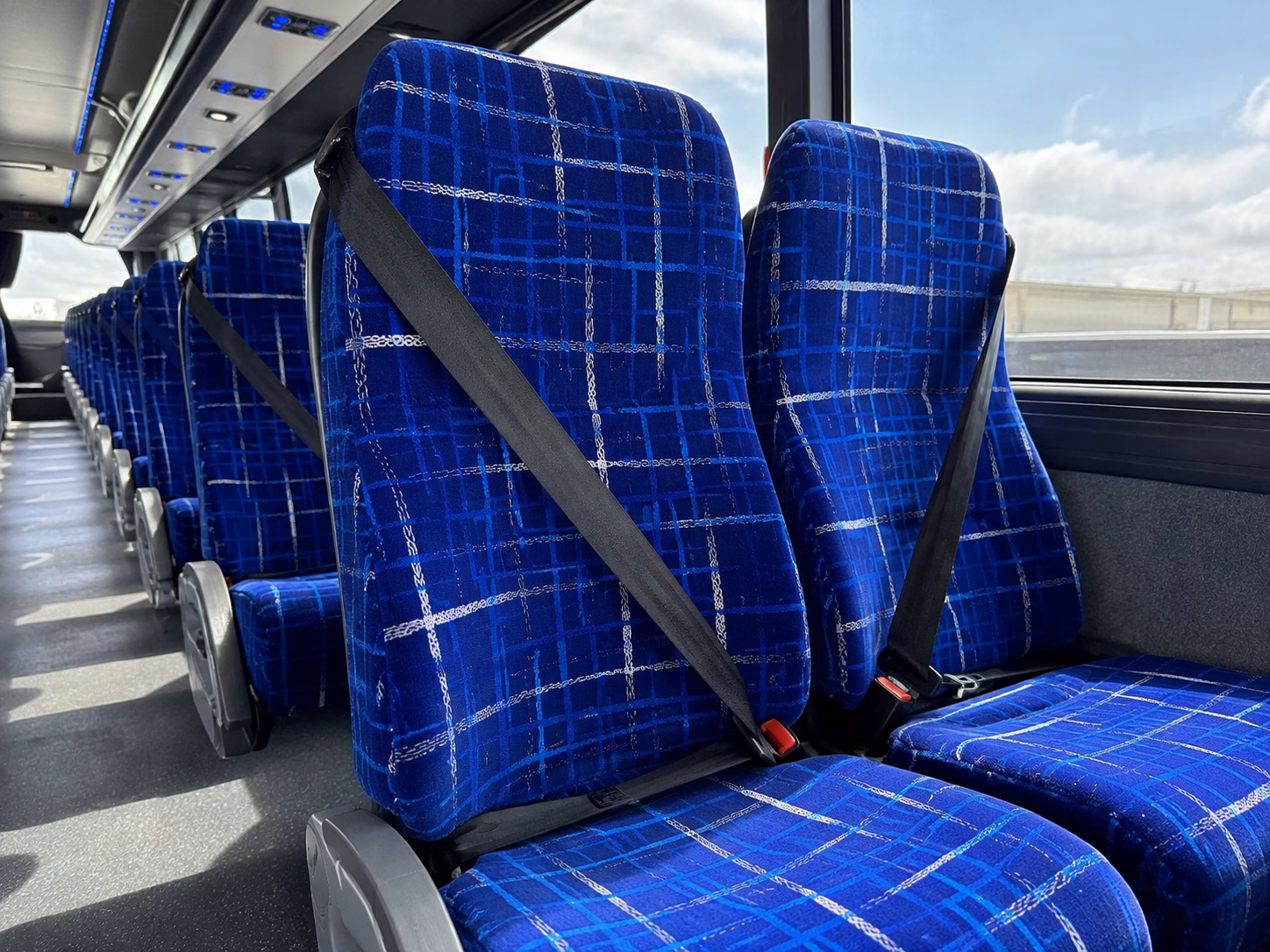 plano ride to the game in comfort with a plano charter bus